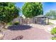 Private backyard with elegant gazebo and decorative water feature for relaxation at 14436 W Ventura St, Surprise, AZ 85379