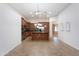 Stylish kitchen with stainless appliances, granite countertops, and open-concept layout at 14436 W Ventura St, Surprise, AZ 85379