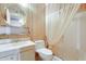 Cozy bathroom offers a shower-tub combination with a white vanity at 15608 N 57Th Dr, Glendale, AZ 85306