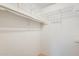Walk-in closet features wire shelving and ample storage space at 15608 N 57Th Dr, Glendale, AZ 85306