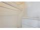 Bright closet featuring shelving and drawers for organized storage at 15608 N 57Th Dr, Glendale, AZ 85306