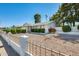 A single-story home features desert landscaping for low maintenance and easy living at 15608 N 57Th Dr, Glendale, AZ 85306