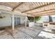 Inviting covered patio provides a relaxing space with outdoor kitchen area at 15608 N 57Th Dr, Glendale, AZ 85306