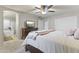 Spacious main bedroom featuring a television, ensuite bathroom and ample closet space at 15969 W Adams St, Goodyear, AZ 85338