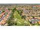 Beautiful aerial view of the community, golf course, lakes, and lush landscaping at 18854 N 73Rd Dr, Glendale, AZ 85308