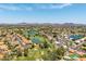 Beautiful aerial view of the community, golf course, and surrounding mountains at 18854 N 73Rd Dr, Glendale, AZ 85308