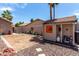 Backyard features a shed, landscaping, and plenty of space for outdoor activities at 18854 N 73Rd Dr, Glendale, AZ 85308