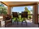 Balcony features comfortable seating with a great view of the pool area at 18854 N 73Rd Dr, Glendale, AZ 85308