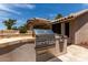 Premium outdoor kitchen with stainless steel grill and convenient storage at 18854 N 73Rd Dr, Glendale, AZ 85308