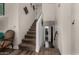 Carpeted staircase offers architectural interest and seamless transition between levels at 18854 N 73Rd Dr, Glendale, AZ 85308