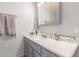 Bathroom features a vanity, sink, and well-lit mirror, blending style with functionality at 1925 W 12Th Ave, Apache Junction, AZ 85120