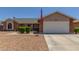 Charming single Gathering home featuring manicured landscaping and a two-car garage at 1925 W 12Th Ave, Apache Junction, AZ 85120