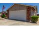 Charming single Gathering home featuring manicured landscaping and a two-car garage at 1925 W 12Th Ave, Apache Junction, AZ 85120