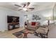 Cozy living room features hardwood floors and neutral paint, ideal for entertaining guests at 1925 W 12Th Ave, Apache Junction, AZ 85120