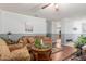 Cozy living room features hardwood floors, perfect for relaxing with friends and Gathering at 1925 W 12Th Ave, Apache Junction, AZ 85120