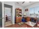 Versatile office space features built-in shelves and a classic sewing desk at 1925 W 12Th Ave, Apache Junction, AZ 85120