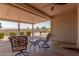 Cozy covered patio featuring outdoor furniture and a grill, perfect for relaxing at 1925 W 12Th Ave, Apache Junction, AZ 85120