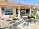 Inviting backyard patio with covered seating area and serene views at 2053 E Clubhouse Dr, Phoenix, AZ 85048