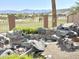 Beautiful backyard landscaping including rock water feature and views of the golf course and mountains at 2053 E Clubhouse Dr, Phoenix, AZ 85048