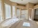 Luxurious bathroom features a jetted tub, separate shower, and bright natural light at 2053 E Clubhouse Dr, Phoenix, AZ 85048