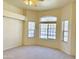 Bedroom bathed in natural light through several windows, with neutral color palette at 2053 E Clubhouse Dr, Phoenix, AZ 85048