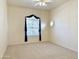 Cozy carpeted bedroom enhanced by natural light through its window at 2053 E Clubhouse Dr, Phoenix, AZ 85048