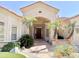Beautiful front entrance with palm trees flanking the door and a tiled walkway at 2053 E Clubhouse Dr, Phoenix, AZ 85048