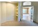 Spacious living room with built-in shelves and view to the next room at 2053 E Clubhouse Dr, Phoenix, AZ 85048