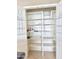Spacious walk-in pantry with adjustable shelves provides ample storage for kitchen essentials at 2053 E Clubhouse Dr, Phoenix, AZ 85048