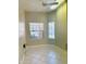 Bright room with tile floors and large windows, perfect for an office or guest room at 2053 E Clubhouse Dr, Phoenix, AZ 85048