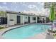 Backyard with pool, patio, and lush landscaping, perfect for outdoor living at 2109 W Berridge Ln, Phoenix, AZ 85015