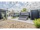 Backyard with hot tub, patio, and desert-friendly landscaping at 2109 W Berridge Ln, Phoenix, AZ 85015