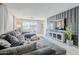 Comfortable living room featuring a large sectional and stylish decor accents at 2109 W Berridge Ln, Phoenix, AZ 85015