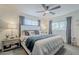 Serene main bedroom with soft lighting, neutral tones, and a comfortable king-size bed at 2109 W Berridge Ln, Phoenix, AZ 85015