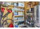 Well-organized storage room with shelving and tools, providing ample space for equipment and supplies at 2109 W Berridge Ln, Phoenix, AZ 85015