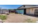 Spacious backyard area, ideal for outdoor activities and relaxation, featuring a shed and partial privacy fencing at 2129 N Summer St, Mesa, AZ 85203