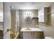 Bathroom featuring a bathtub with a curtain, and a countertop sink at 2129 N Summer St, Mesa, AZ 85203