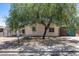 Charming home with mature shade tree enhancing curb appeal and providing a cool, inviting setting at 2129 N Summer St, Mesa, AZ 85203