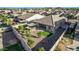 Aerial view of a backyard featuring a decorative turf area and desert landscaping at 2236 W Aston Dr, San Tan Valley, AZ 85144