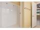 Shower features glass door, and towel rack for a clean and elegant look at 2236 W Aston Dr, San Tan Valley, AZ 85144