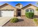 Charming single-story home featuring a well-manicured yard, a two-car garage, and inviting front entrance at 2236 W Aston Dr, San Tan Valley, AZ 85144