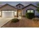 Charming single-story home featuring a well-manicured yard, a two-car garage, and inviting front entrance at 2236 W Aston Dr, San Tan Valley, AZ 85144