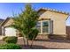 A delightful single-story home with well-maintained landscaping, a two-car garage, and a charming exterior at 2236 W Aston Dr, San Tan Valley, AZ 85144