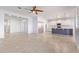 Spacious living room featuring tile floors, recessed lighting and flowing layout to the kitchen at 2236 W Aston Dr, San Tan Valley, AZ 85144