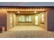 Beautifully covered patio with neutral tones and recessed lighting providing an ideal setting for outdoor gatherings at 2236 W Aston Dr, San Tan Valley, AZ 85144