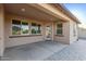 Covered patio seamlessly extends indoor living space, offering a comfortable transition to the outdoors at 2236 W Aston Dr, San Tan Valley, AZ 85144
