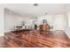 The dining room area boasts hardwood floors and seating for six beneath recessed lighting at 2542 E Los Alamos St, Gilbert, AZ 85295