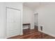 Hallway with wood floors, a closet, and a small table at 2542 E Los Alamos St, Gilbert, AZ 85295