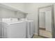 Laundry room featuring a Samsung washer and dryer, and a shelf at 2542 E Los Alamos St, Gilbert, AZ 85295