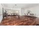 Spacious living area with hardwood floors seamlessly blends living room, dining, and kitchen at 2542 E Los Alamos St, Gilbert, AZ 85295
